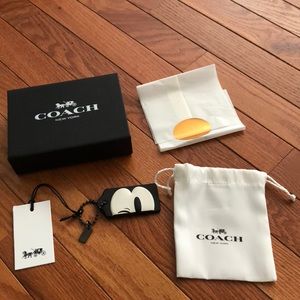 Coach winking Mickey hangtag